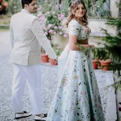 A candid moment from a destination engagement in the beautiful gardens of Nainital. The groom leads his bride, and her happy expression says it all.