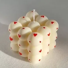 A special order for Galentine's Day. Our classic bubble candle gets a lovely update with tiny hand-painted red hearts.