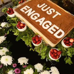 A large Tiramisu tray made for an engagement party, beautifully decorated with "Just Engaged" lettering. It’s a perfect dessert for sharing with loved ones.
