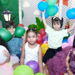 Kids playing with balloons in the soft play area. Simple joys are often the best.