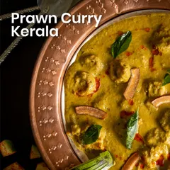 I bring the taste of the coast to you with my Kerala Prawn Curry. Succulent prawns are simmered in a creamy, aromatic coconut curry, capturing the authentic flavors of South India.