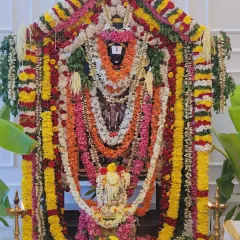 An elaborate alankaram (decoration) for a Satyanarayana pooja. I believe in making the sacred space beautiful to welcome the divine, using fresh flowers and traditional arrangements to create a feeling of peace and celebration.