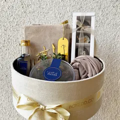 My Eid and Ramadan hampers are curated with spiritual and thoughtful touches. This velvet box includes premium dates, attar, a beautiful scarf, and other essentials to make the celebration truly special.