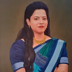 This formal portrait of a woman in a saree was painted with acrylic on canvas. The subtle lighting and serene expression were key elements in capturing the subject's dignified presence.
