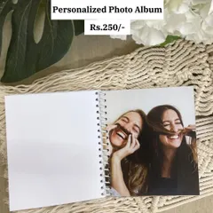 An inside page of the personalized photo album, showing a full-page photo print. The spiral binding allows the book to lay flat for easy viewing.