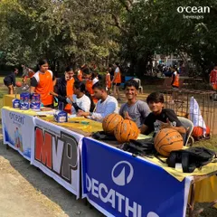 The registration desk buzzing with activity. We partner with brands like Decathlon and O'cean to make our events a complete experience for every player.