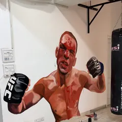 The finished mural of a true warrior, Nate Diaz. This artwork embodies the grit, toughness, and never-quit attitude we cultivate in our gym.