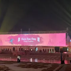 The main stage area at the Ayodhya Deepotsav, with the large LED screen serving as the central visual element. We handle all aspects of staging and screen integration for a seamless production.