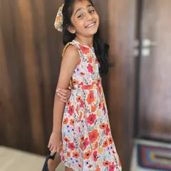 That smile says it all! Our floral backless frock is designed for comfort and endless smiles, perfect for a picnic in the park or a day of exploring.