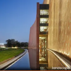 At the Zydus Headquarters in Ahmedabad, we used water as a central design element to create a serene microclimate. The building's reflection on the water's surface illustrates our philosophy of creating a seamless dialogue between the built form and the natural landscape, resulting in spaces that are both monumental and tranquil.