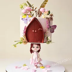 This is where baking meets magic. I designed this gravity-defying cake to create a show-stopping centerpiece, featuring a fairy house that appears to float, supported by a delicate, handcrafted figurine.