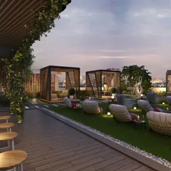 An open-air cinema on a residential terrace in Noida, complete with comfortable seating, private cabanas, and an outdoor bar. We design lifestyle amenities that transform common areas into exclusive entertainment zones for beautiful evenings under the stars.