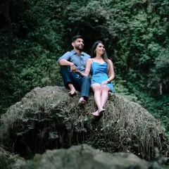 A quiet moment together on a mossy rock, surrounded by the lush greenery of a Shimla forest. These are the peaceful, natural shots that I love to capture.