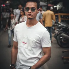 I love the challenge of an impromptu street portrait. This shot was taken on a busy Bangalore street, using natural light to create a moody, focused look that makes the subject stand out from the crowd. It’s about finding stories in plain sight.