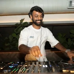 A smile breaks through as I feel the energy from the crowd. It's a two-way street, and I feed off the dance floor's vibe.