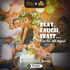 Play, Laugh, Feast... Fun for All Ages! A father helps his little girl take her first bite of birthday cake, a classic and heartwarming party moment.