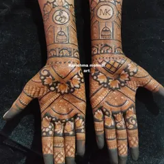 Personalization is key for modern bridal work. This engagement design incorporates the couple's initials 'MK' and ring symbols, a technique I teach to help you offer custom henna art to your clients.