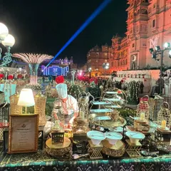 A spectacular wedding buffet set against the royal backdrop of Udaipur's City Palace. Our live stations and elaborate displays are designed to match the opulence of the venue, providing a feast fit for royalty at this grand destination wedding.