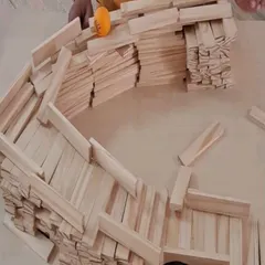 The focus in the room is always so real and inspiring. Each child gets their own set of planks and a space to bring their ideas to life, learning about balance and dedication through hands-on building.