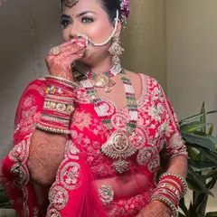 That beautiful bridal smile says it all. Her makeup was designed to be timeless, with a soft glow that enhances her features without overpowering her natural beauty.