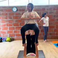 This is what trust looks like. In our Acro Yoga workshops, we learn to lift each other up, both literally and figuratively. It’s a practice of shared gravity, communication, and playful connection.