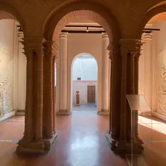 The arched hallway of the Sister Nivedita Museum, where restored brickwork and new bas-relief panels coexist. Our restoration philosophy involves a careful dialogue between the old and the new, respecting the building's original character.