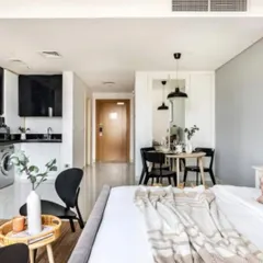 A 3D visualization of a compact studio apartment layout. This helps clients understand how to maximize functionality and style in a smaller footprint.