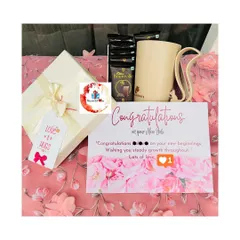Celebrate professional milestones with a thoughtful gift set. This hamper includes a "Congratulations on your New Job" card, a stylish mug, and premium Cadbury Bournville chocolates, perfect for employee appreciation or corporate gifting.