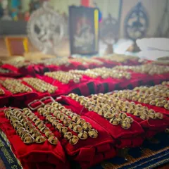 The ghungroo is more than just an anklet of bells; it's a sacred part of a dancer's journey. This close-up shows the ghungroos, blessed and ready for my students during the Ghungroo Pooja ceremony, a tradition we deeply cherish.