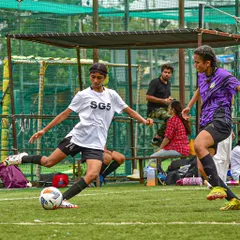 A Lioness executing a perfect pass during a league game. Our training emphasizes precision and technical skill.