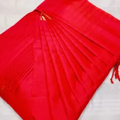 This service works beautifully on all types of sarees, not just heavy silks. Here is a bright red saree with perfectly set pleats, ready to be draped for any occasion. It ensures a clean, professional look every single time you wear it.