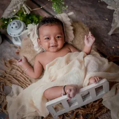 The sweetest smile. This little one is wide awake and happy, and I was so lucky to capture this moment of pure joy.