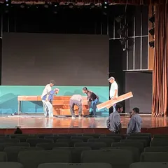 The process of building the stage set for our production. A lot of hard work goes into creating the perfect backdrop for our performances.