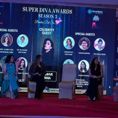 A panel discussion allows for a deeper, more interactive conversation. Here, I am seated with fellow experts, discussing various aspects of health and wellness relevant to today's working women.