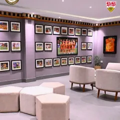 The lounge area at the Bhutanese facility, where players can relax and analyze their game. A professional environment is key to development.