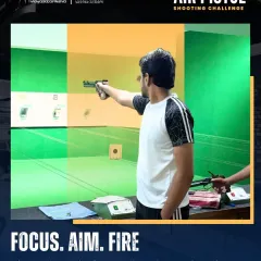 A shooter takes aim during our Air Pistol Shooting Challenge. Our indoor range provides a controlled environment perfect for the high-precision discipline of 10m air pistol shooting.