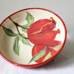 The slight tilt of the Pomegranate Bowl showcases its handmade form. No two are ever identical, which is the true charm of pieces made by hand rather than a machine.