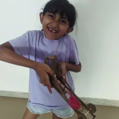 She is so proud of the DIY rubber powered car she made this summer. That expression of pure joy and accomplishment is what we strive for.