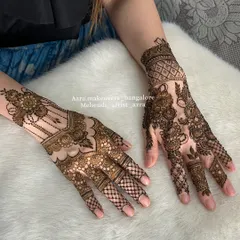 A view of both hands, showing a popular non-bridal design that is different on each hand for a modern look.
