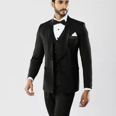 Our double-breasted tuxedo offers a bold, confident statement. The six-button front and broad lapels create a distinctive silhouette that speaks to a classic, yet assertive, sense of style.