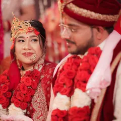 A beautiful portrait of the couple during their pheras. The bride's expression shows her looking towards her future, with her groom by her side.