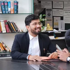 A moment of discussion in the law library. Behind every argument made in court are hours of research, strategy, and preparation. This is where the groundwork for a successful case is laid.
