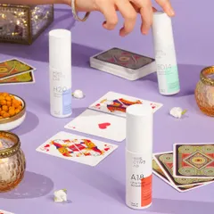 A playful Diwali-themed shot featuring skincare products amidst a game of cards. This creative setup connects the brand with the fun and social traditions of the festival.