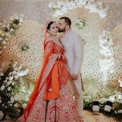A tender kiss on the forehead, a gesture of love and protection. This is one of those unscripted, in-between moments that we cherish, showing the deep affection shared between the couple.