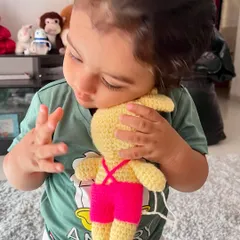 Look at this sweet baby hugging his new bunny toy. It is so wonderful to see my creations become a child's favorite companion.