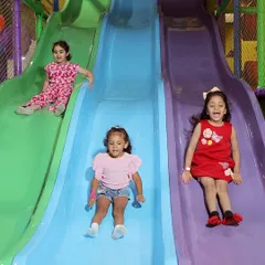 The pure joy of our multi-lane slides. Our indoor play area is designed for endless fun, with safe and exciting structures that let kids race, slide, and laugh all day long.