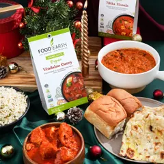 A festive feast styled for a Christmas campaign. I paired these ready-to-cook Indian curry kits with traditional breads and holiday decor to create a warm, inviting scene for a holiday meal at home.