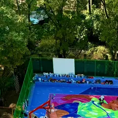 The early stages of the NBA court project. You can see the sheer amount of paint and planning required to cover such a large surface.
