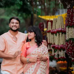 Using the vibrant backdrop of a local flower stall in Bangalore, this portrait captures the couple in a culturally rich and colorful setting. It’s a great example of how I use the environment to enhance a couple's story.