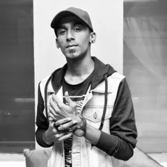 A casual portrait that captures my everyday style. I'm a down to earth guy who loves music and connecting with people, and I try to bring that friendly vibe to all my virtual DJ sets.
